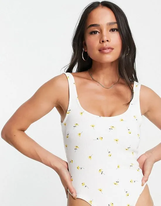 https://images.styletyx.com/images/rib-bodysuit-in-yellow-delicate-floral-asos-design-1891529_2.webp