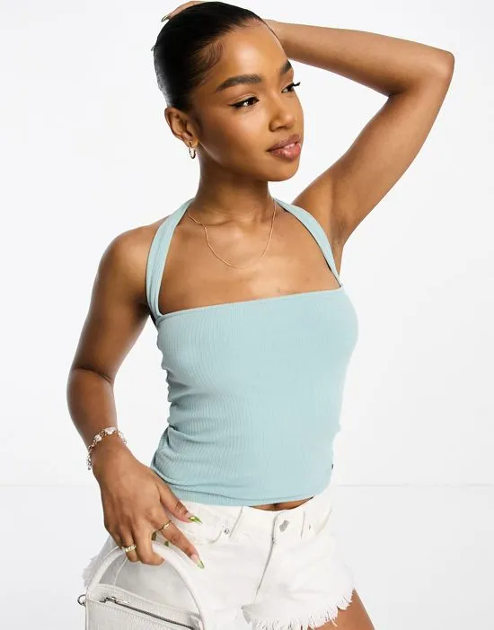 https://images.styletyx.com/images/ribbed-halterneck-tube-top-in-washed-green-pull-bear-216491344_1.webp