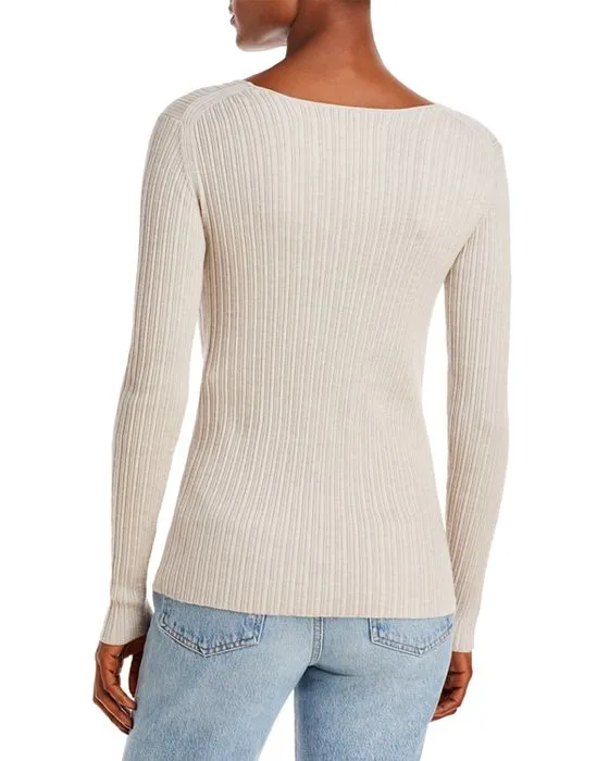 https://images.styletyx.com/images/rione-merino-wool-v-neck-sweater-by-malene-birger-2640824_3.webp