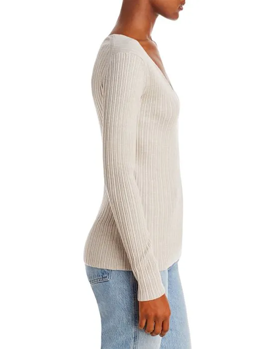 https://images.styletyx.com/images/rione-merino-wool-v-neck-sweater-by-malene-birger-2640824_4.webp