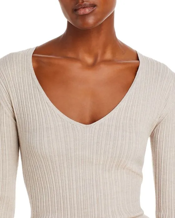 https://images.styletyx.com/images/rione-merino-wool-v-neck-sweater-by-malene-birger-2640824_5.webp