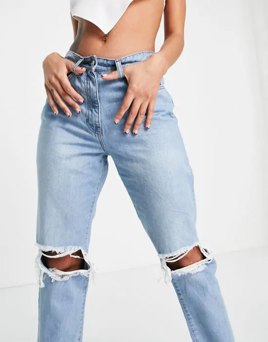 https://images.styletyx.com/images/ripped-mom-jeans-in-light-blue-parisian-1962937_4.webp