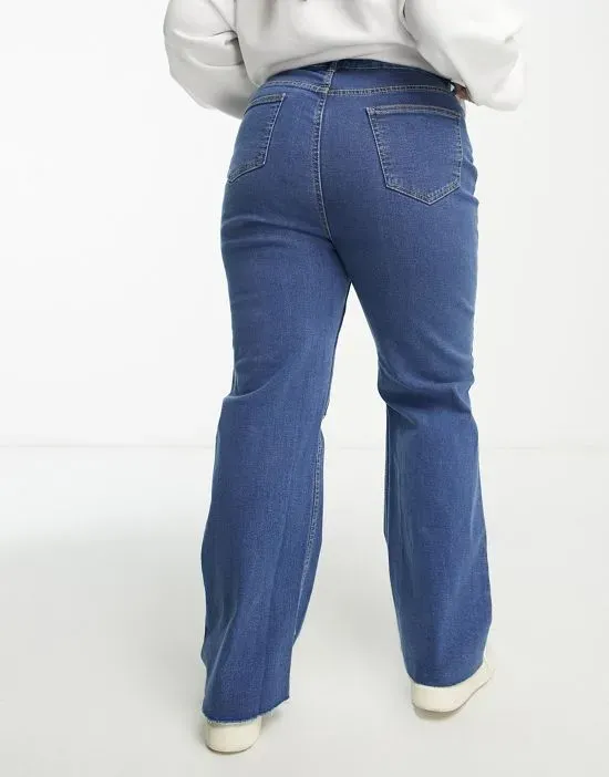 https://images.styletyx.com/images/ripped-wide-leg-jean-in-mid-blue-yours-3067491_2.webp