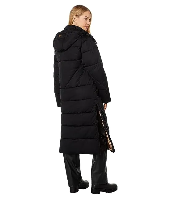 https://images.styletyx.com/images/rose-gold-hardware-longline-puffer-avec-les-filles-13307838_2.webp