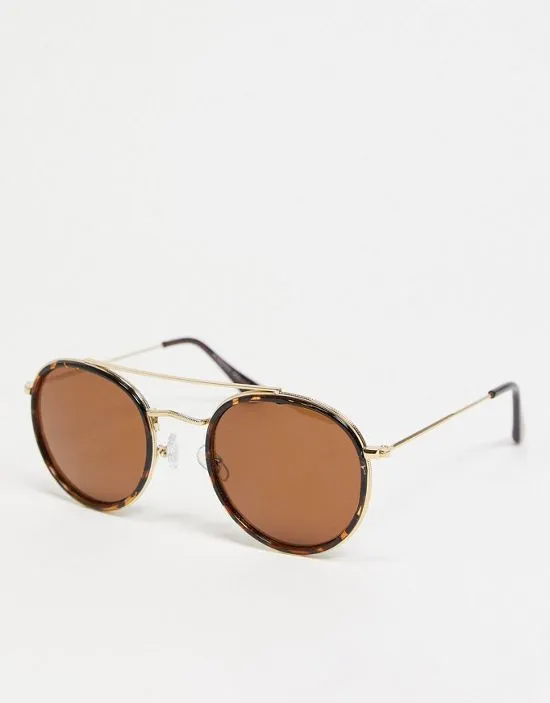 https://images.styletyx.com/images/round-sunglasses-in-tortoiseshell-pieces-2245613_1.webp