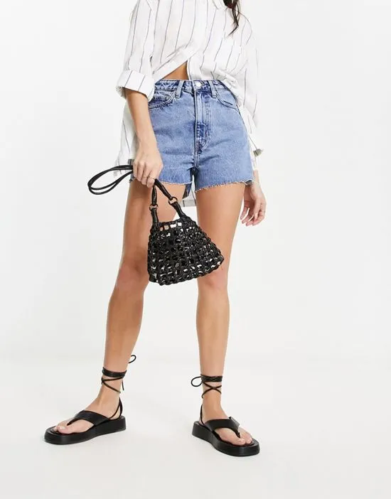 https://images.styletyx.com/images/rowe-high-waisted-denim-mom-short-in-pen-blue-wash-weekday-13291834_2.webp