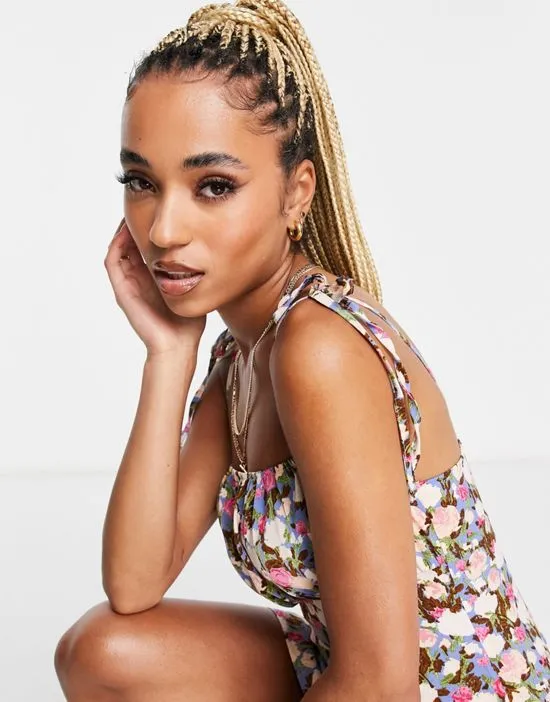 https://images.styletyx.com/images/ruched-bust-dress-with-tie-shoulder-in-multi-floral-missguided-2535594_2.webp