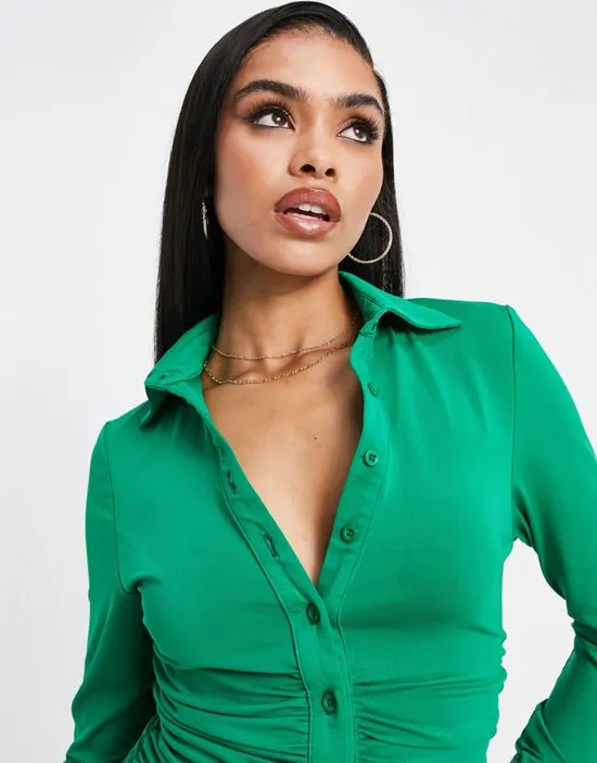 https://images.styletyx.com/images/ruched-button-detail-midi-dress-in-emerald-green-ax-paris-2753200_3.webp