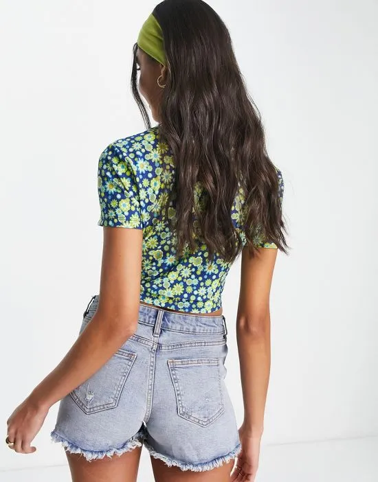 https://images.styletyx.com/images/ruched-front-crop-top-in-yellow-retro-floral-wednesday-s-girl-1886030_2.webp