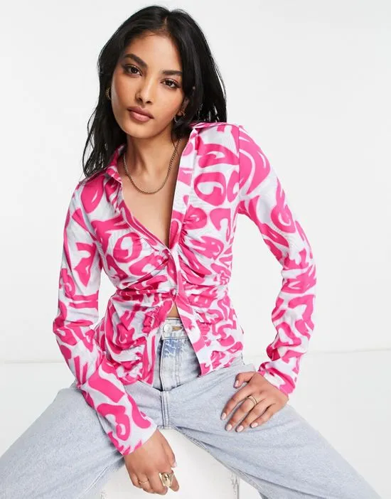https://images.styletyx.com/images/ruched-front-shirt-in-blue-pink-abstract-alphabet-print-asos-design-1883584_1.webp