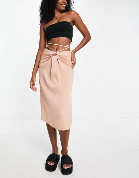 https://images.styletyx.com/images/ruched-satin-strappy-detail-midi-skirt-in-blush-lola-may-2504942_2.webp