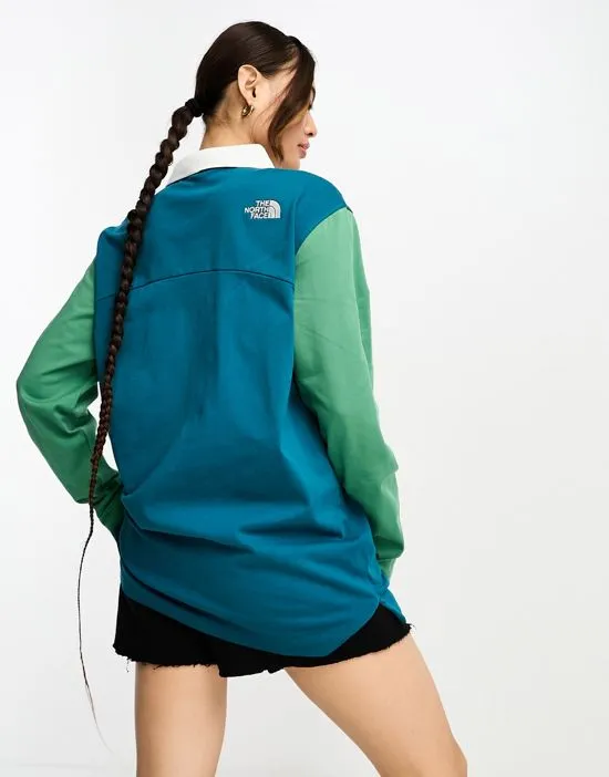 https://images.styletyx.com/images/rugby-boyfriend-fit-heavyweight-polo-in-blue-and-green-exclusive-at-asos-the-north-face-876360362_2.webp