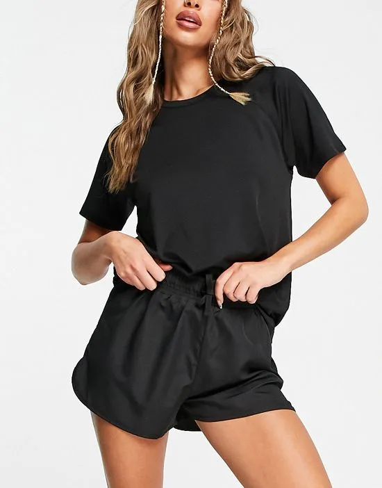 https://images.styletyx.com/images/running-shorts-in-black-threadbare-fitness-2483609_4.webp