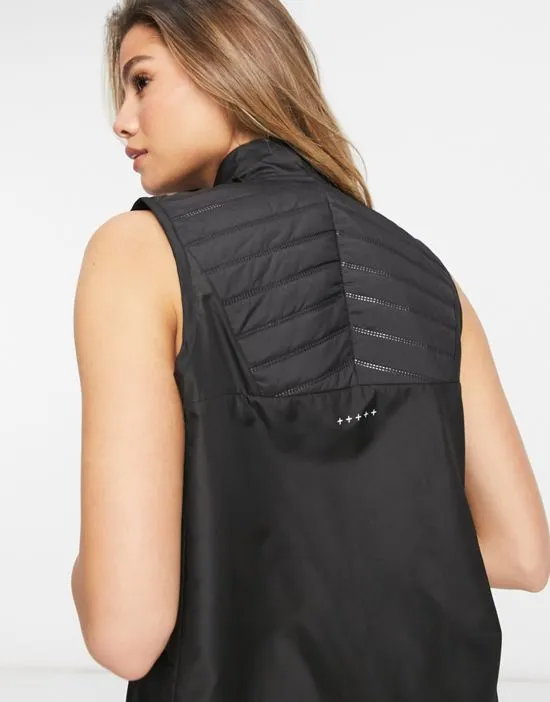 https://images.styletyx.com/images/running-vest-in-black-puma-1912011_3.webp
