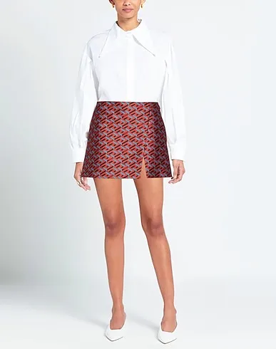 https://images.styletyx.com/images/rust-jacquard-mini-skirt-versace-1224647575_2.webp