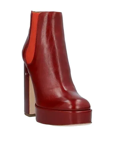 https://images.styletyx.com/images/rust-leather-ankle-boot-laurence-dacade-2282469_2.webp