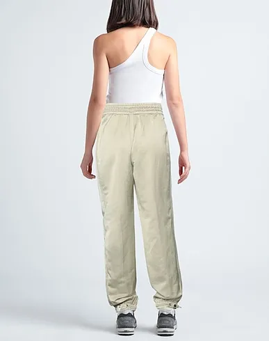 https://images.styletyx.com/images/sage-green-satin-casual-pants-diesel-710358304_3.webp