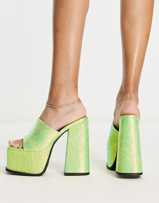 https://images.styletyx.com/images/sagittarius-platform-heeled-sandals-in-green-shimmer-shellys-london-982680988_2.webp