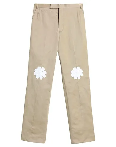 https://images.styletyx.com/images/sand-cotton-twill-casual-pants-thom-browne-13242833_1.webp