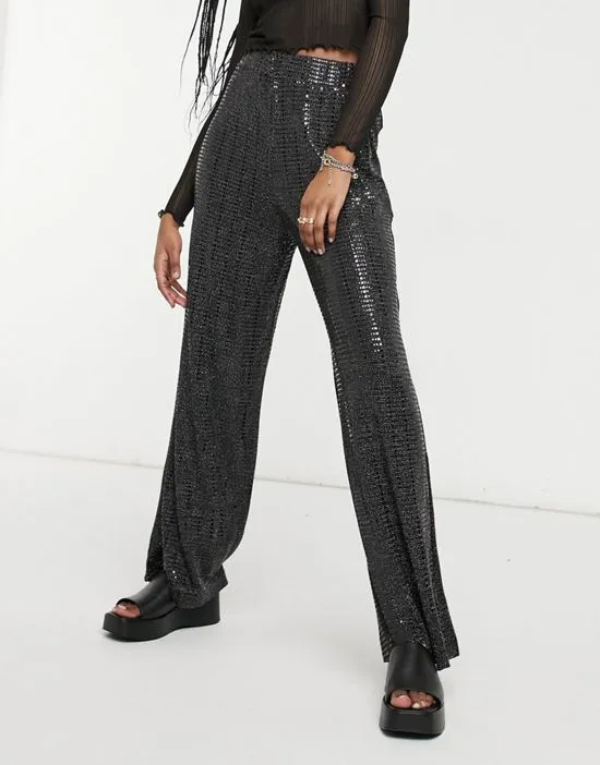 https://images.styletyx.com/images/sandra-wide-leg-sparkly-pants-in-black-selected-13317269_1.webp
