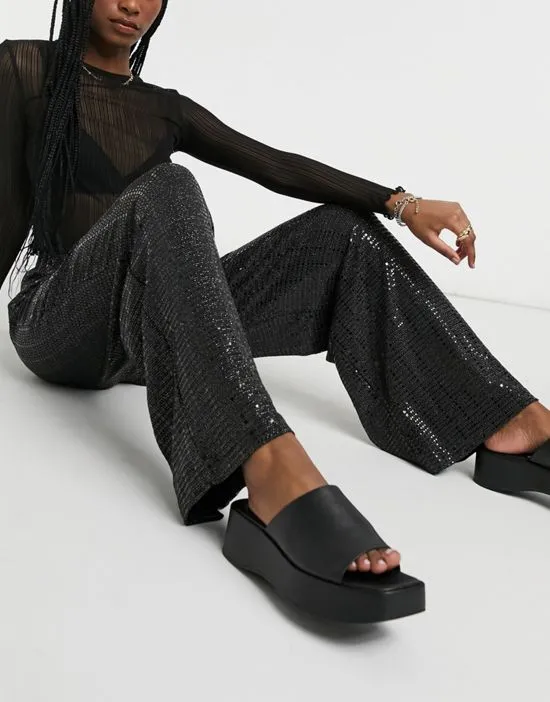 https://images.styletyx.com/images/sandra-wide-leg-sparkly-pants-in-black-selected-13317269_4.webp