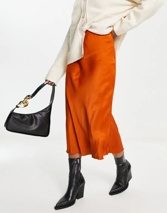 https://images.styletyx.com/images/satin-midi-slip-skirt-in-rust-other-stories-3307574_3.webp