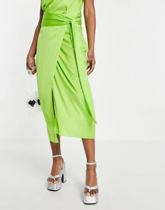 https://images.styletyx.com/images/satin-wrap-midi-skirt-in-lime-green-part-of-a-set-style-cheat-2802082_1.webp