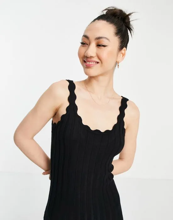 https://images.styletyx.com/images/scallop-straps-knitted-body-conscious-dress-in-black-y-a-s-2559716_3.webp