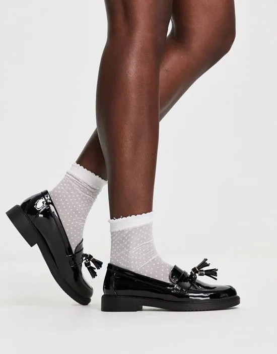 https://images.styletyx.com/images/schuh-lane-tassel-loafers-in-black-patent-schuh-2801483_4.webp