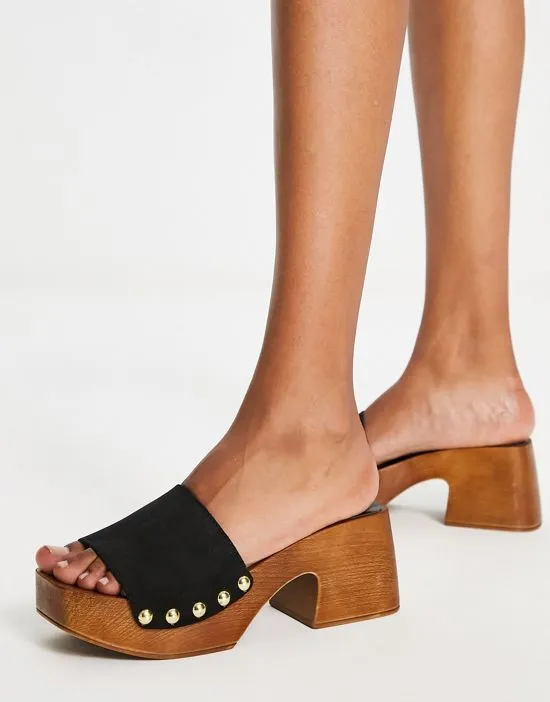 https://images.styletyx.com/images/schuh-tanika-suede-clog-sandals-in-black-schuh-13276737_3.webp
