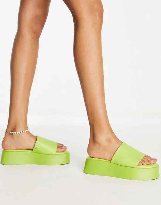 https://images.styletyx.com/images/schuh-tatiana-chunky-mule-sandals-in-green-schuh-1734304_2.webp