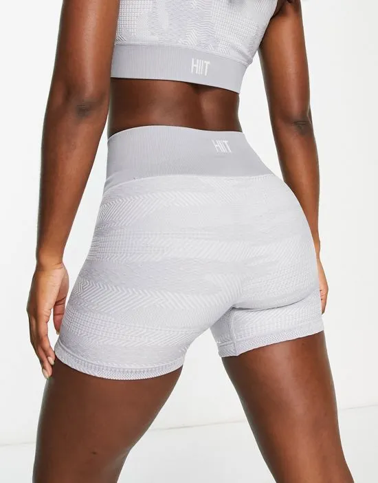 https://images.styletyx.com/images/seamless-booty-short-in-textured-camo-in-gray-hiit-2622603_1.webp