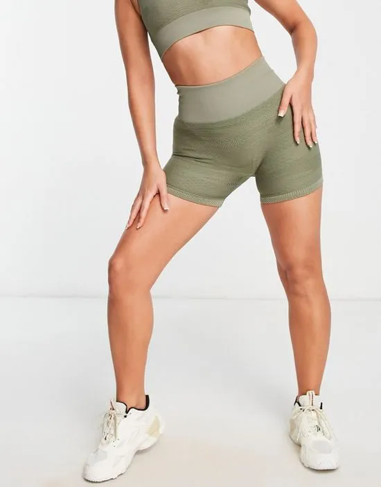 https://images.styletyx.com/images/seamless-booty-shorts-in-textured-camo-in-khaki-hiit-2398279_4.webp