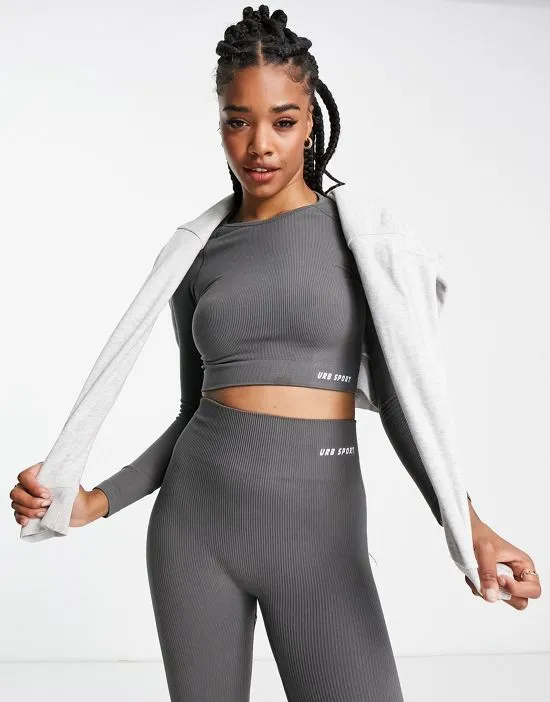 https://images.styletyx.com/images/seamless-long-sleeve-sports-crop-top-in-charcoal-urban-threads-tall-1948726_1.webp