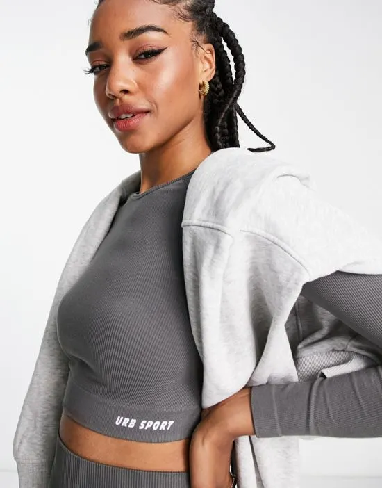 https://images.styletyx.com/images/seamless-long-sleeve-sports-crop-top-in-charcoal-urban-threads-tall-1948726_3.webp
