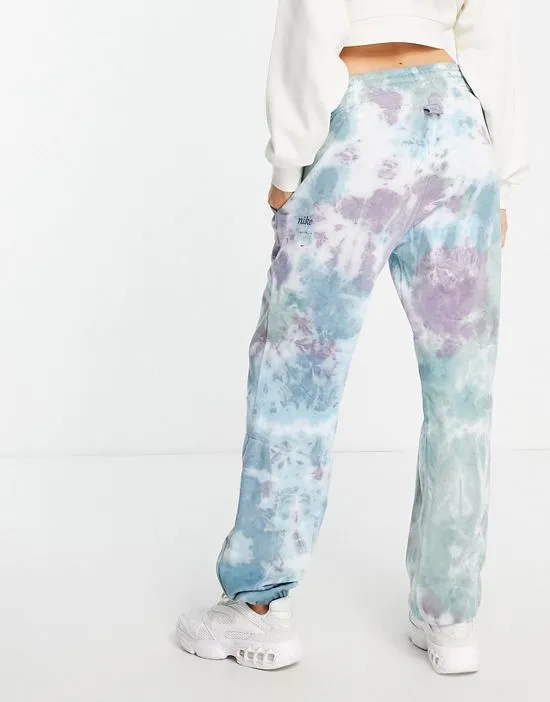 https://images.styletyx.com/images/seasonal-classics-pack-acid-wash-loose-fit-cuffed-sweatpants-in-purple-multi-purple-nike-2033227_2.webp