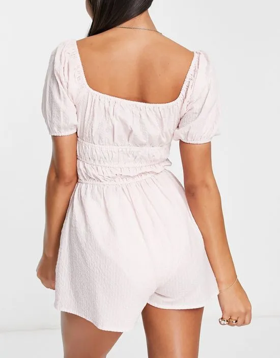 https://images.styletyx.com/images/seersucker-milkmaid-beach-romper-in-pink-asos-design-1754693_2.webp