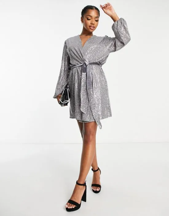 https://images.styletyx.com/images/sequin-wrap-tie-mini-dress-in-silver-style-cheat-3236670_3.webp