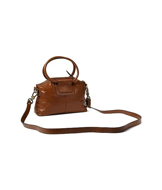 https://images.styletyx.com/images/sheila-zip-top-small-crossbody-hobo-1911572569_2.webp
