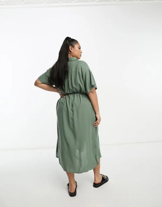 https://images.styletyx.com/images/shirt-midi-dress-with-tie-belt-in-green-vero-moda-curve-13276150_4.webp