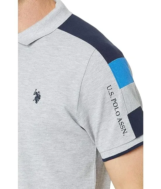 https://images.styletyx.com/images/short-sleeve-color-block-pique-knit-polo-shirt-u-s-polo-assn-13425213_3.webp