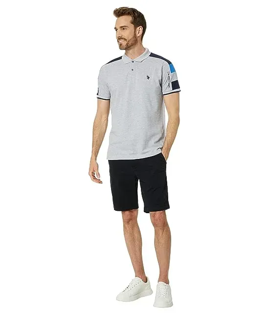 https://images.styletyx.com/images/short-sleeve-color-block-pique-knit-polo-shirt-u-s-polo-assn-13425213_4.webp