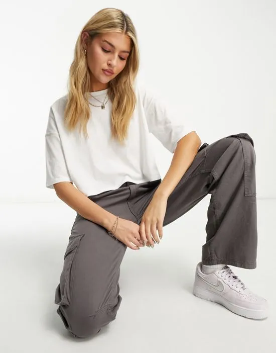 https://images.styletyx.com/images/short-sleeve-cropped-oversized-boxy-t-shirt-with-seam-detail-in-white-miss-selfridge-13337218_1.webp