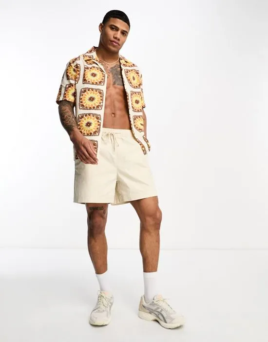 https://images.styletyx.com/images/short-sleeve-sun-print-shirt-in-yellow-river-island-392434029_3.webp