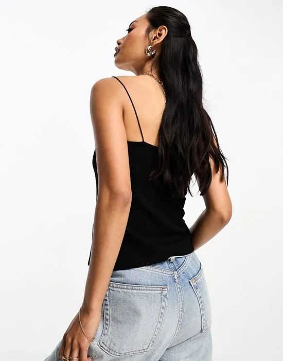 https://images.styletyx.com/images/shrunken-spaghetti-strap-top-in-black-na-kd-1010072272_4.webp