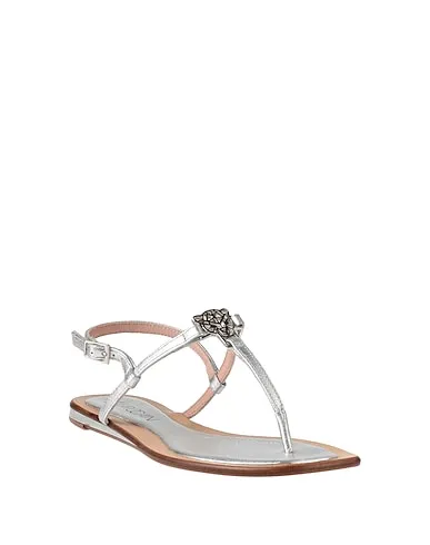 https://images.styletyx.com/images/silver-leather-flip-flops-marc-cain-13076475_2.webp