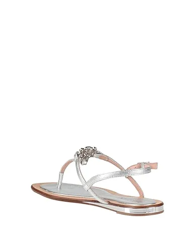 https://images.styletyx.com/images/silver-leather-flip-flops-marc-cain-13076475_3.webp
