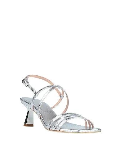 https://images.styletyx.com/images/silver-leather-sandals-gold-rouge-998836926_2.webp