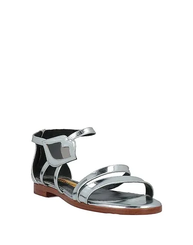 https://images.styletyx.com/images/silver-leather-sandals-rupert-sanderson-2901057_2.webp