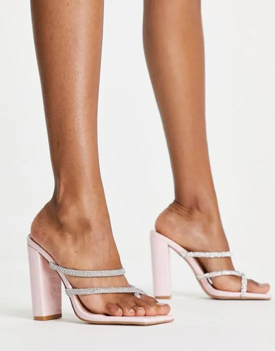 https://images.styletyx.com/images/simmi-london-heera-heeled-mules-with-embellished-straps-in-pink-simmi-shoes-2411410_3.webp